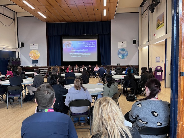 A picture of students and speakers during one of the panel sessions